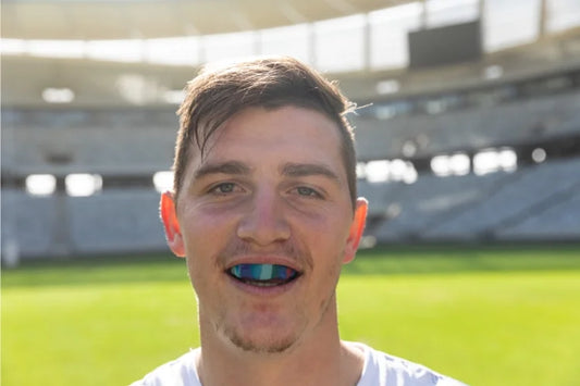 An athlete wearing a sports mouth guard