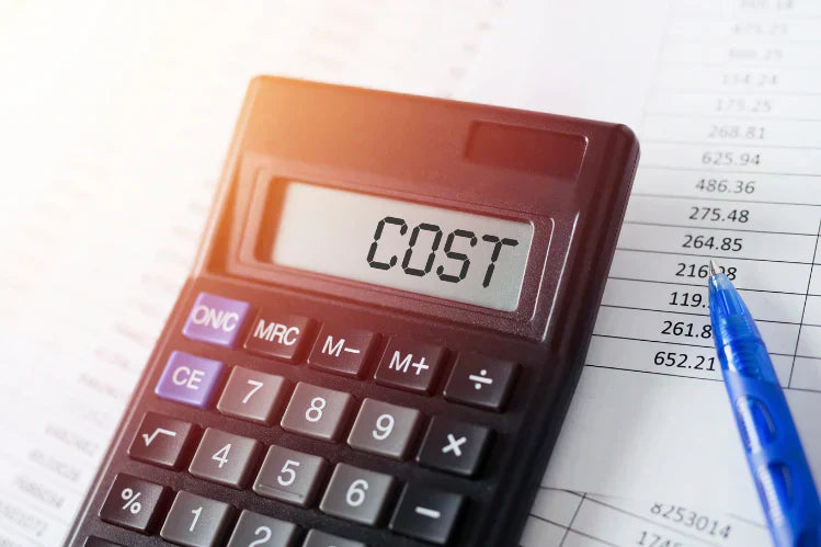 A calculator with the cost written on the screen