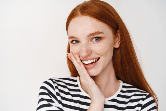 A woman with a bright white smile