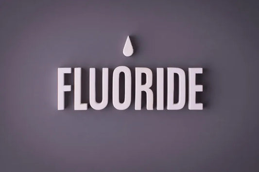 Fluoride written on a gray background 