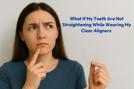  A girl holding clear aligners while thinking why my teeth are not straightening while wearing my clear aligners 